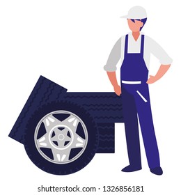 mechanic worker with tires car