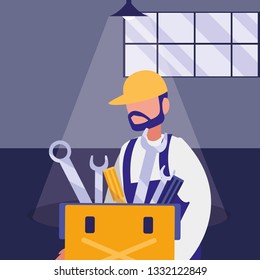 mechanic worker with toolbox in the workplace