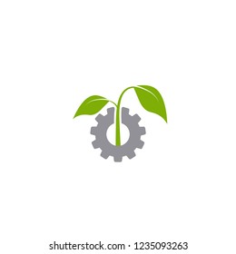Mechanical gear and green leaves. Isolated on white background. Eco friendly technology icon. World Environment day label.  Bio technology. Vector illustration.