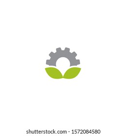 Mechanical gear and green leaves. Isolated on white background. Eco friendly technology icon. World Environment day label.  Bio technology. Vector illustration.