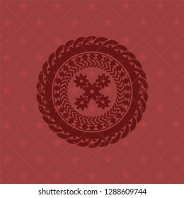mechanism icon inside badge with red background