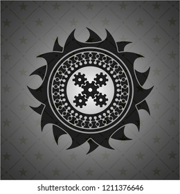 mechanism icon inside black badge