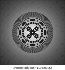 mechanism icon inside black emblem