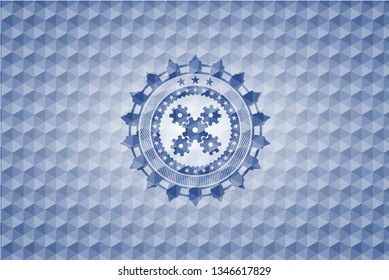 mechanism icon inside blue emblem or badge with abstract geometric pattern background.
