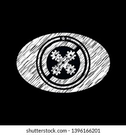 mechanism icon inside chalk emblem written on a blackboard