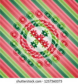 mechanism icon inside christmas style badge..
