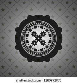 mechanism icon inside dark badge