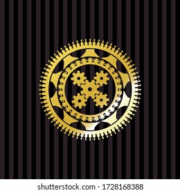 mechanism icon inside gold emblem. 