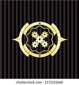 mechanism icon inside golden badge or emblem