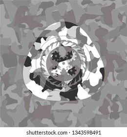 mechanism icon inside grey camo texture