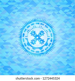 mechanism icon inside light blue emblem with mosaic ecological style background
