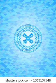 mechanism icon inside light blue emblem with mosaic background