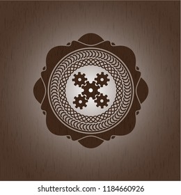 mechanism icon inside realistic wooden emblem
