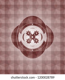 mechanism icon inside red emblem with geometric pattern background. Seamless.