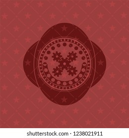 mechanism icon inside red icon or emblem