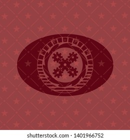 mechanism icon inside red icon or emblem