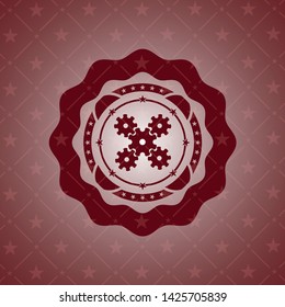 mechanism icon inside red emblem. Retro