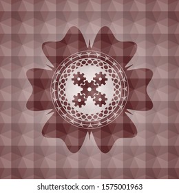 mechanism icon inside red seamless emblem with geometric background.