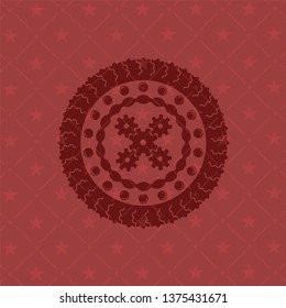 mechanism icon inside retro red emblem