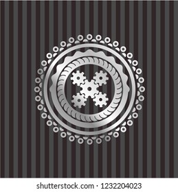 mechanism icon inside silver shiny badge