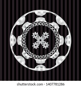 mechanism icon inside silver shiny badge