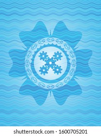 mechanism icon inside water concept badge background.
