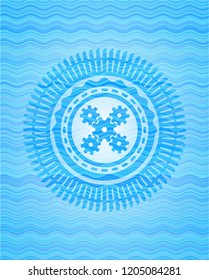 mechanism icon inside water wave concept badge background.