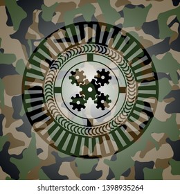 mechanism icon on camo pattern