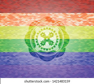 mechanism icon on mosaic background with the colors of the LGBT flag