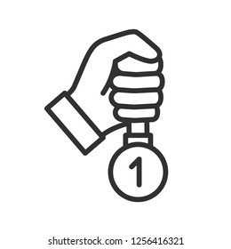 medal in hand. linear icon. Line with editable stroke
