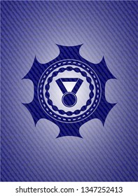 medal icon inside denim background