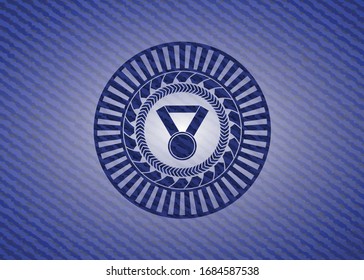 medal icon inside emblem with jean background