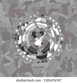 medal icon inside grey camo texture