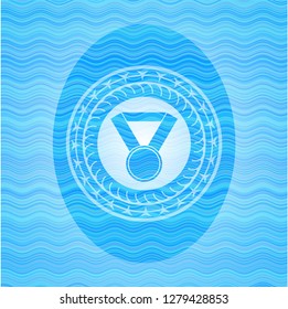 medal icon inside light blue water badge background.