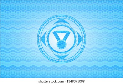 medal icon inside light blue water wave emblem.