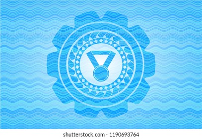 medal icon inside sky blue water emblem.