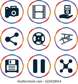 Media icons set. set of 9 media filled icons such as movie tape, share, diskette, film tape, pause, mp3 player on hand, camera tape