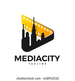 Media logo in the form of a sign (play) with a film and a city in the inside