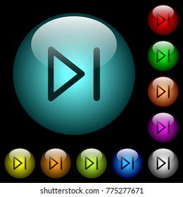 Media next icons in color illuminated spherical glass buttons on black background. Can be used to black or dark templates