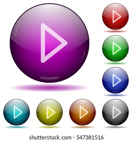 Media play icons in color glass sphere buttons with shadows