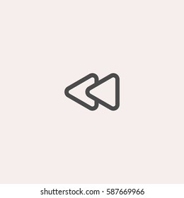Media player button icon. Rewind sign vector