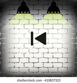 Media player control button. Rewinding sign.
