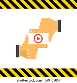 Media player sign between human fingers