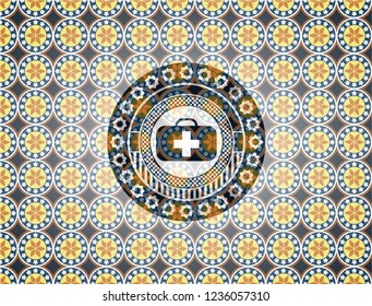 medical briefcase icon inside arabesque style emblem. arabic decoration.