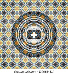 medical briefcase icon inside arabesque emblem background. arabic decoration.