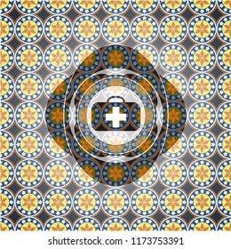 medical briefcase icon inside arabic badge background. Arabesque decoration.