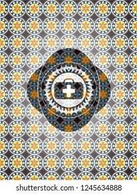 medical briefcase icon inside arabic style emblem. Arabesque decoration.