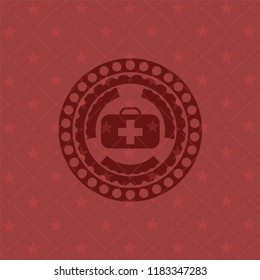 medical briefcase icon inside badge with red background