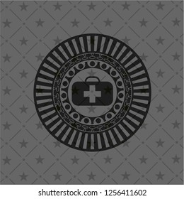 medical briefcase icon inside black emblem
