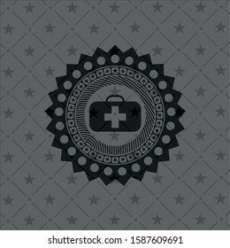 medical briefcase icon inside dark emblem